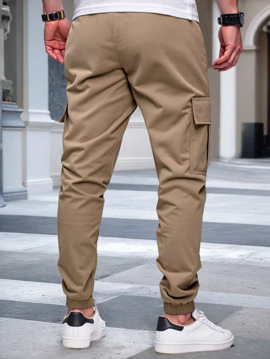 Pánské jogger kalhoty s elastickým pasem, bočními kapsami a lehkou tkaninou