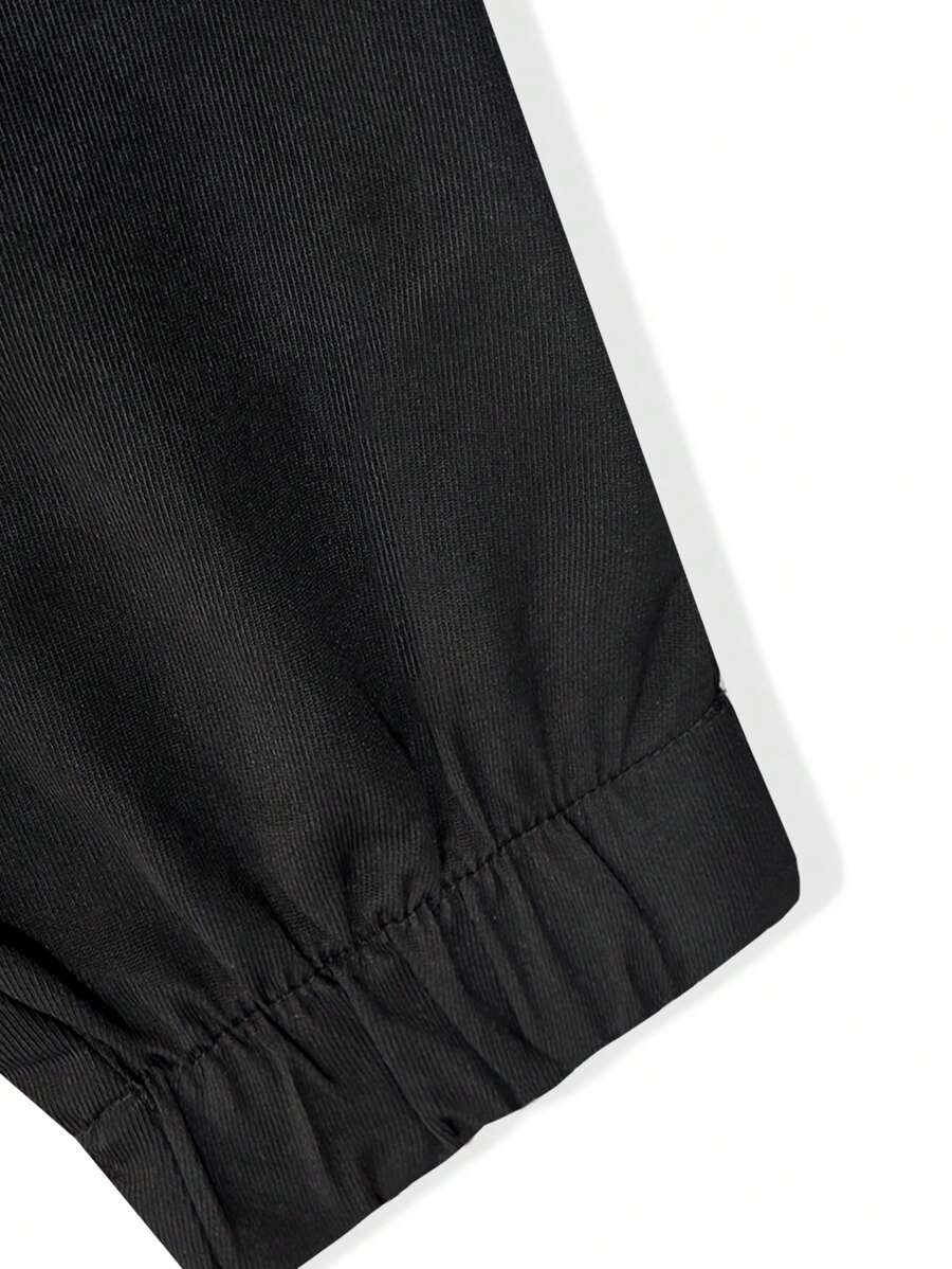 Pánské jogger kalhoty s elastickým pasem, bočními kapsami a lehkou tkaninou