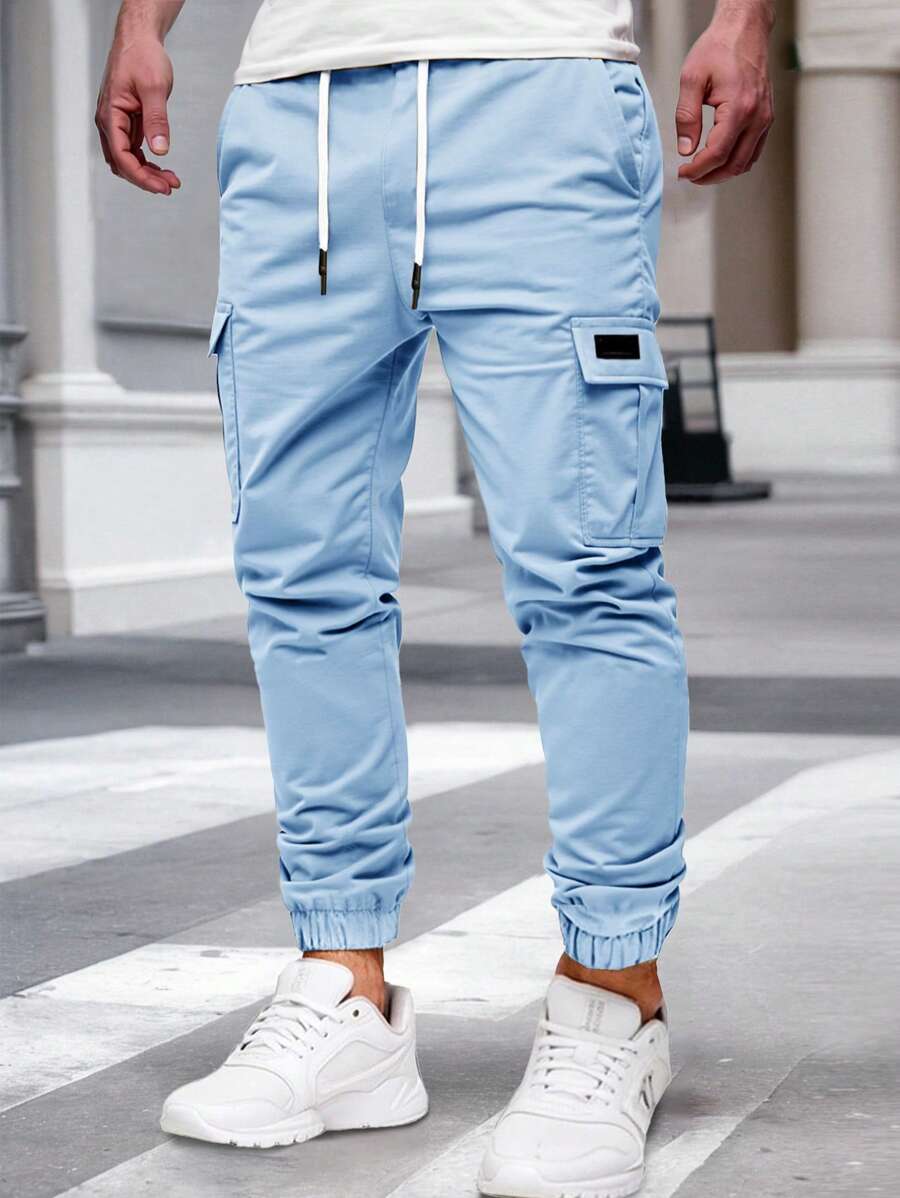 Pánské jogger kalhoty s elastickým pasem, bočními kapsami a lehkou tkaninou