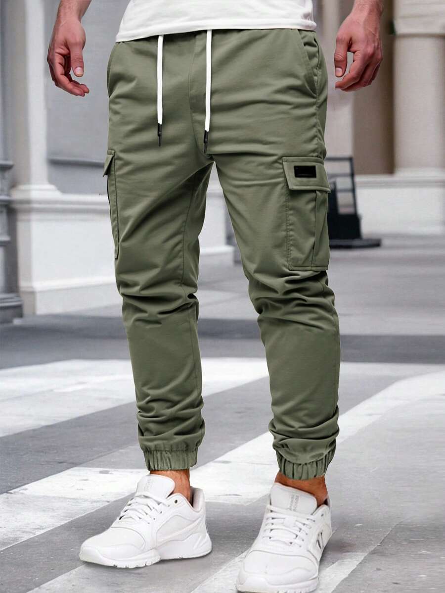 Pánské jogger kalhoty s elastickým pasem, bočními kapsami a lehkou tkaninou