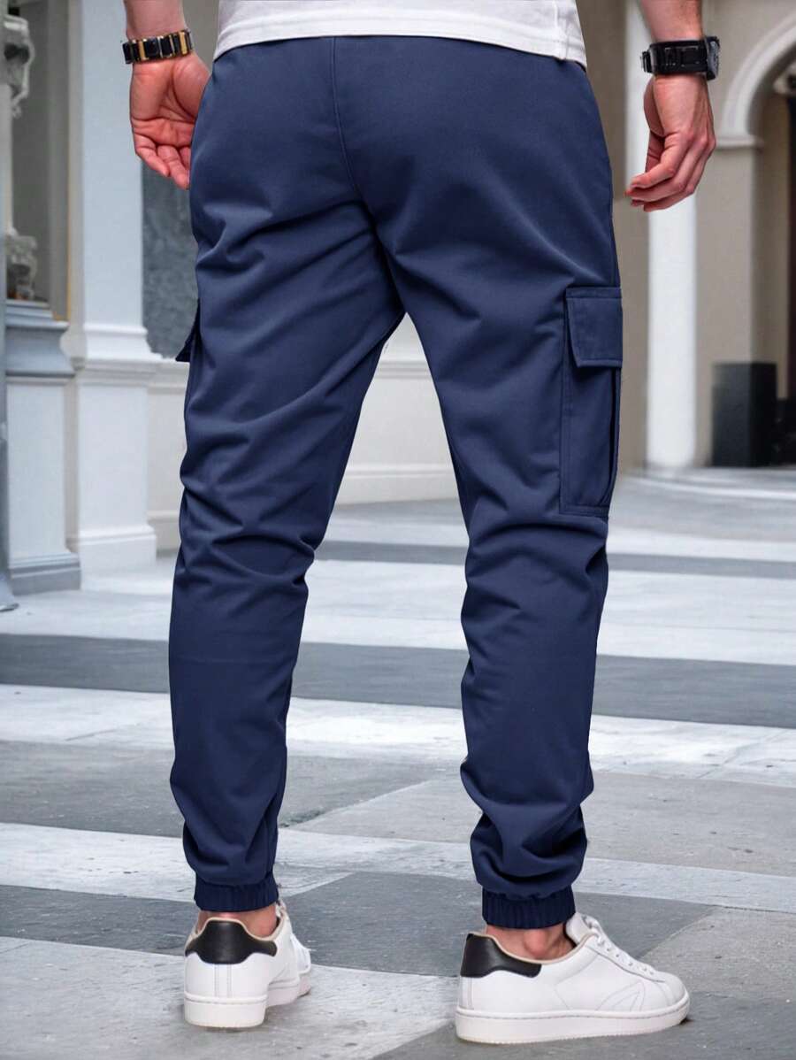 Pánské jogger kalhoty s elastickým pasem, bočními kapsami a lehkou tkaninou