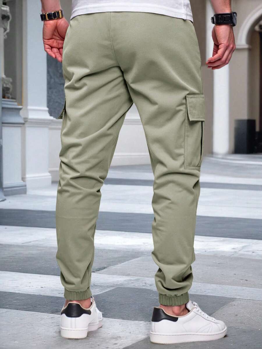 Pánské jogger kalhoty s elastickým pasem, bočními kapsami a lehkou tkaninou