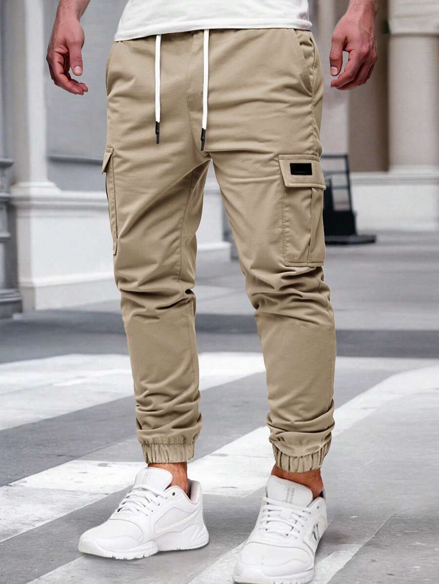 Pánské jogger kalhoty s elastickým pasem, bočními kapsami a lehkou tkaninou