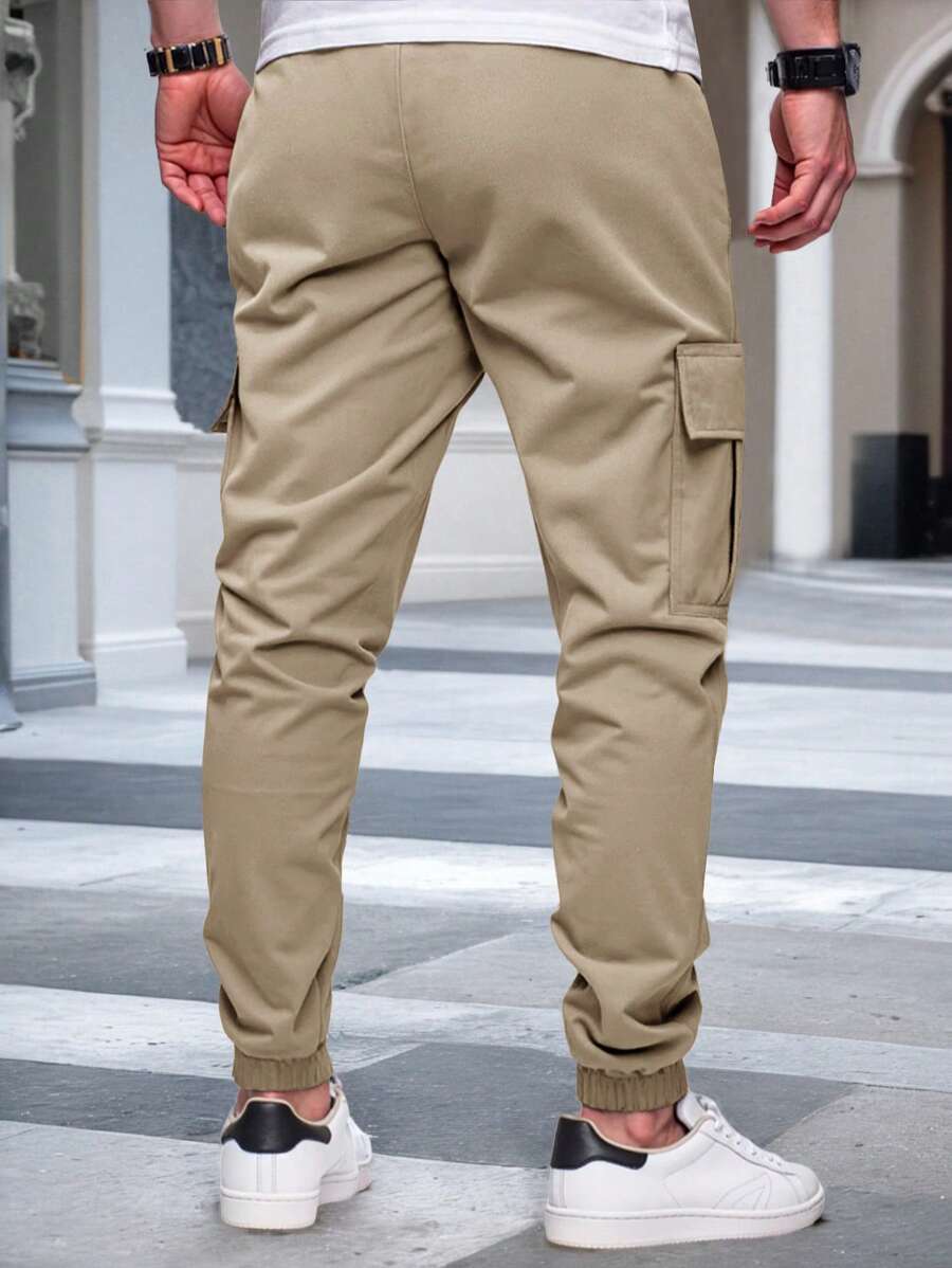Pánské jogger kalhoty s elastickým pasem, bočními kapsami a lehkou tkaninou