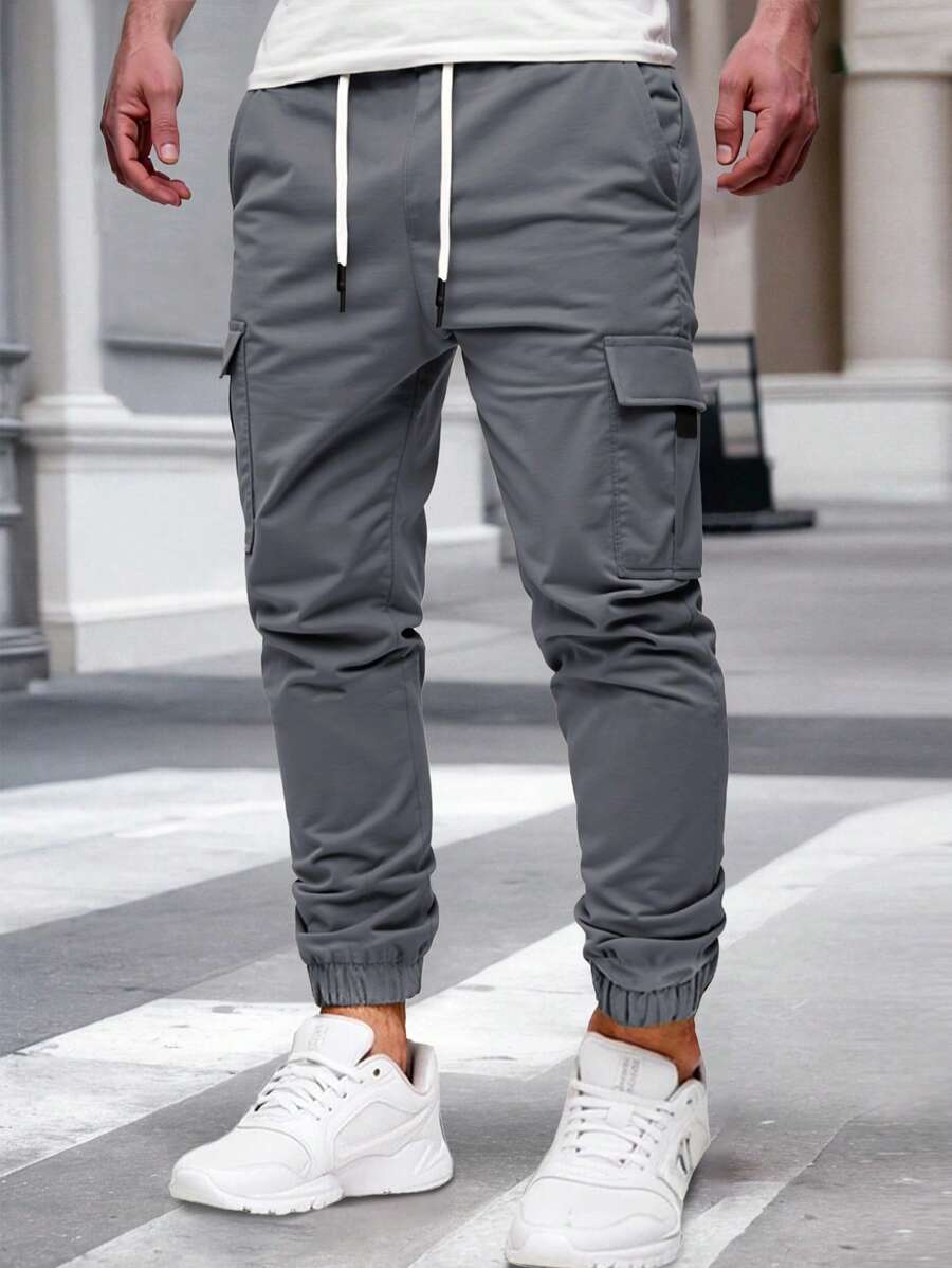 Pánské jogger kalhoty s elastickým pasem, bočními kapsami a lehkou tkaninou