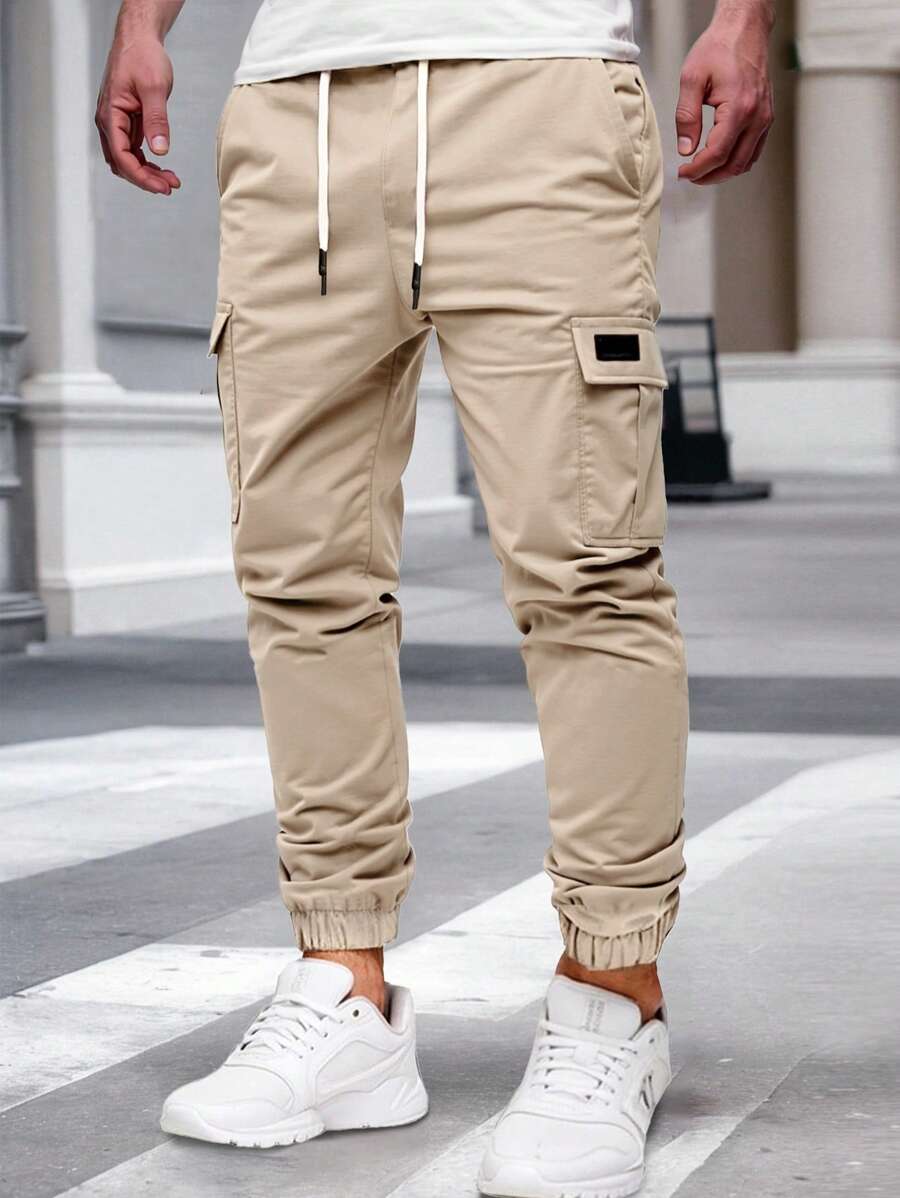 Pánské jogger kalhoty s elastickým pasem, bočními kapsami a lehkou tkaninou