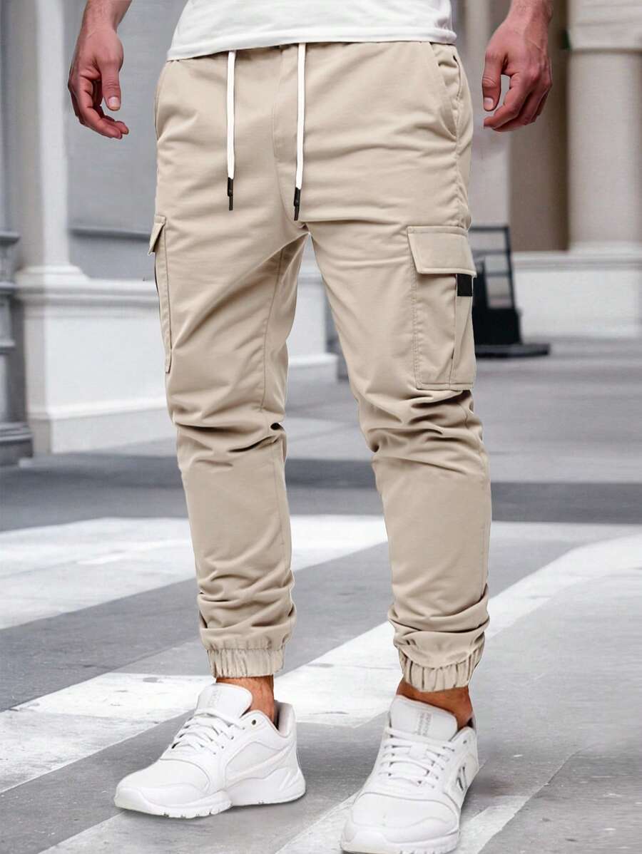 Pánské jogger kalhoty s elastickým pasem, bočními kapsami a lehkou tkaninou