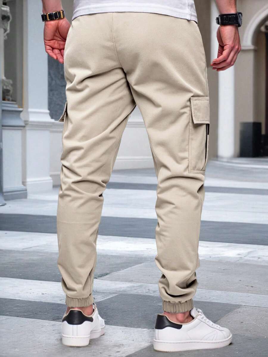 Pánské jogger kalhoty s elastickým pasem, bočními kapsami a lehkou tkaninou